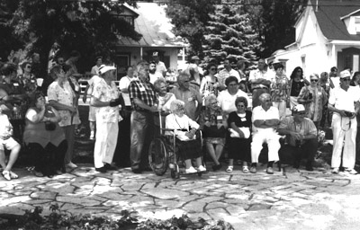 Pilons at Park Antoine Pilon surrounding Marthe Carrire-Pilon, 102  years of age (center).